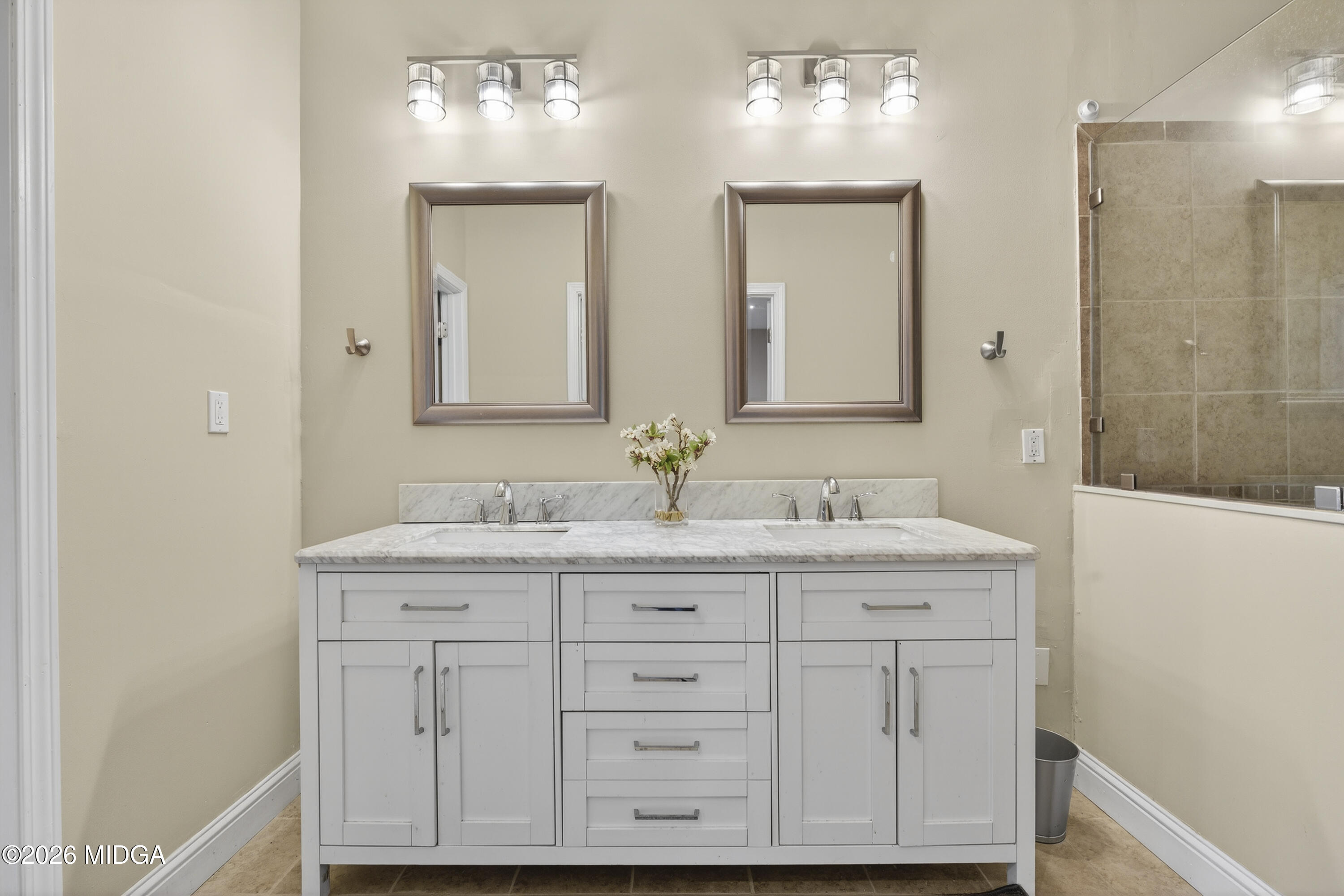 855 Tufthunter Macon, GA 31210 - Photo 54 of 87 a bathroom with a granite countertop sink a mirror and a