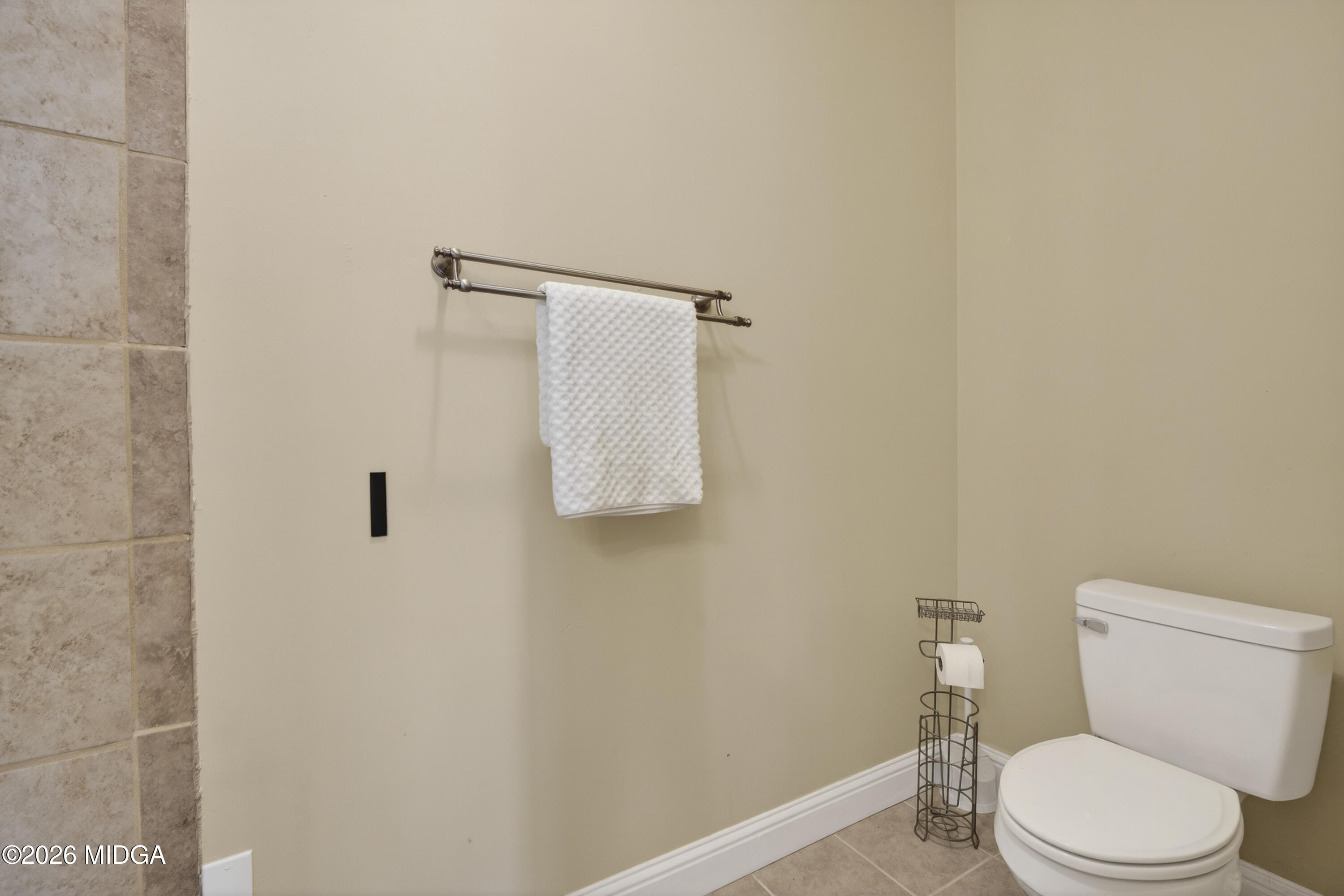 855 Tufthunter Macon, GA 31210 - Photo 60 of 86 a white toilet sitting next to a white wall