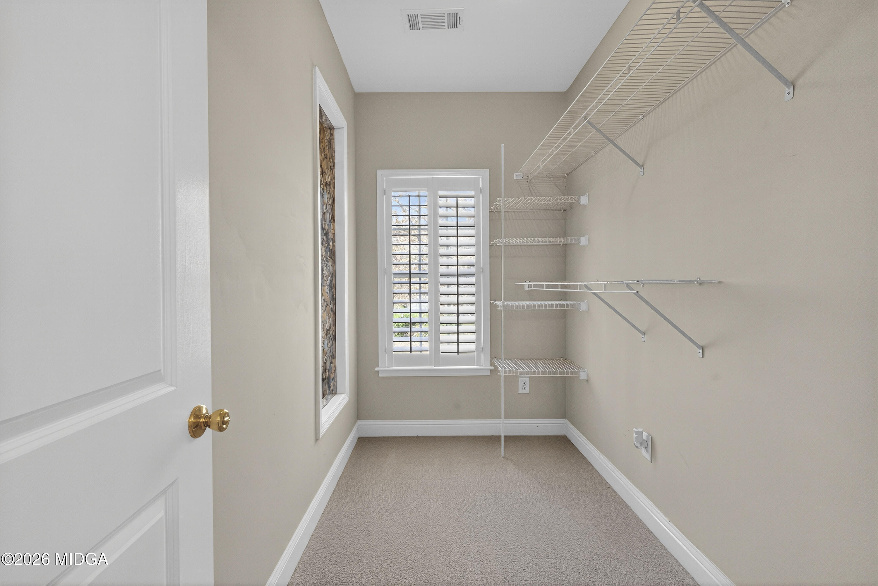 855 Tufthunter Macon, GA 31210 - Photo 60 of 87 a view of an empty room with a window