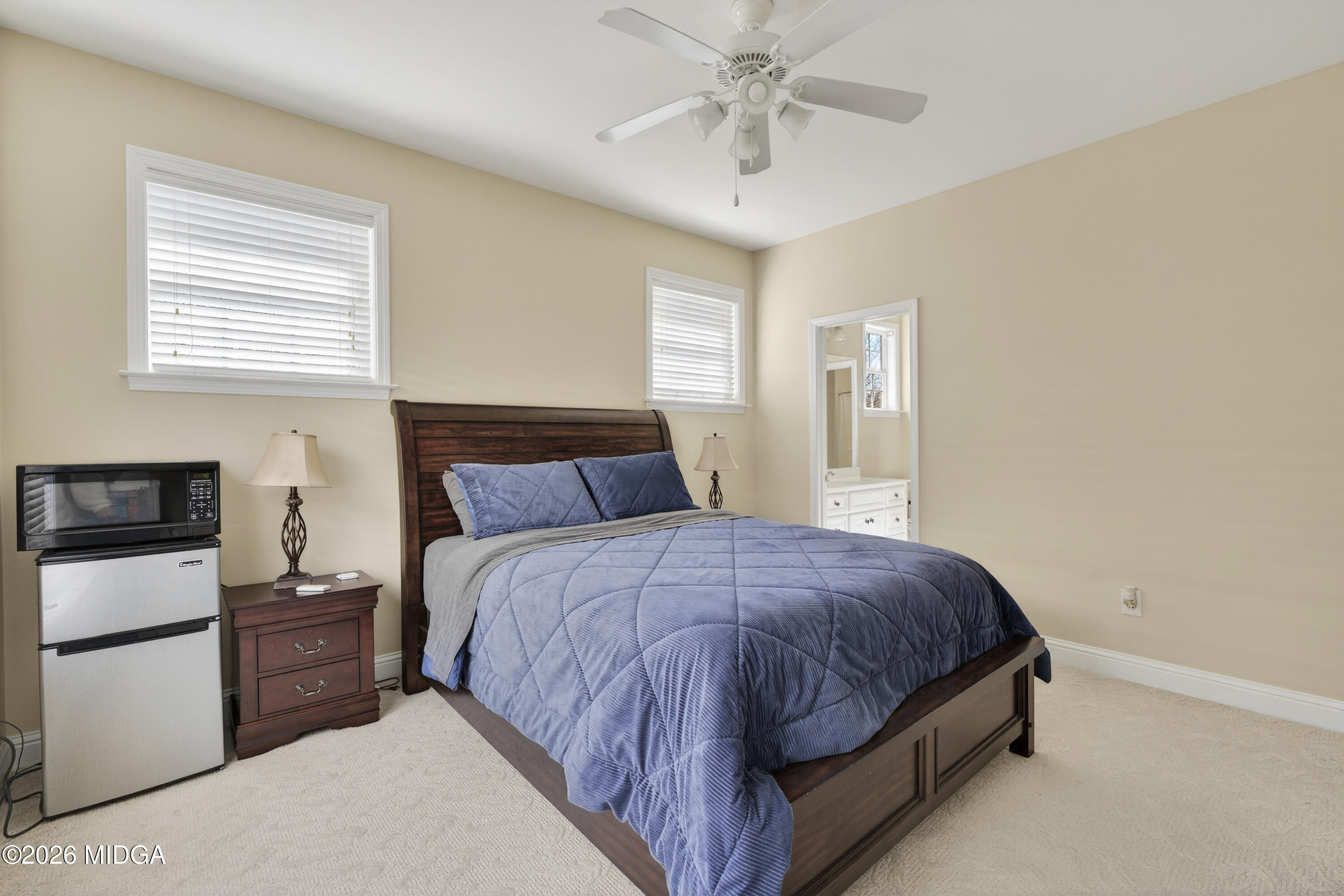 855 Tufthunter Macon, GA 31210 - Photo 62 of 87 a bedroom with a bed and a ceiling fan