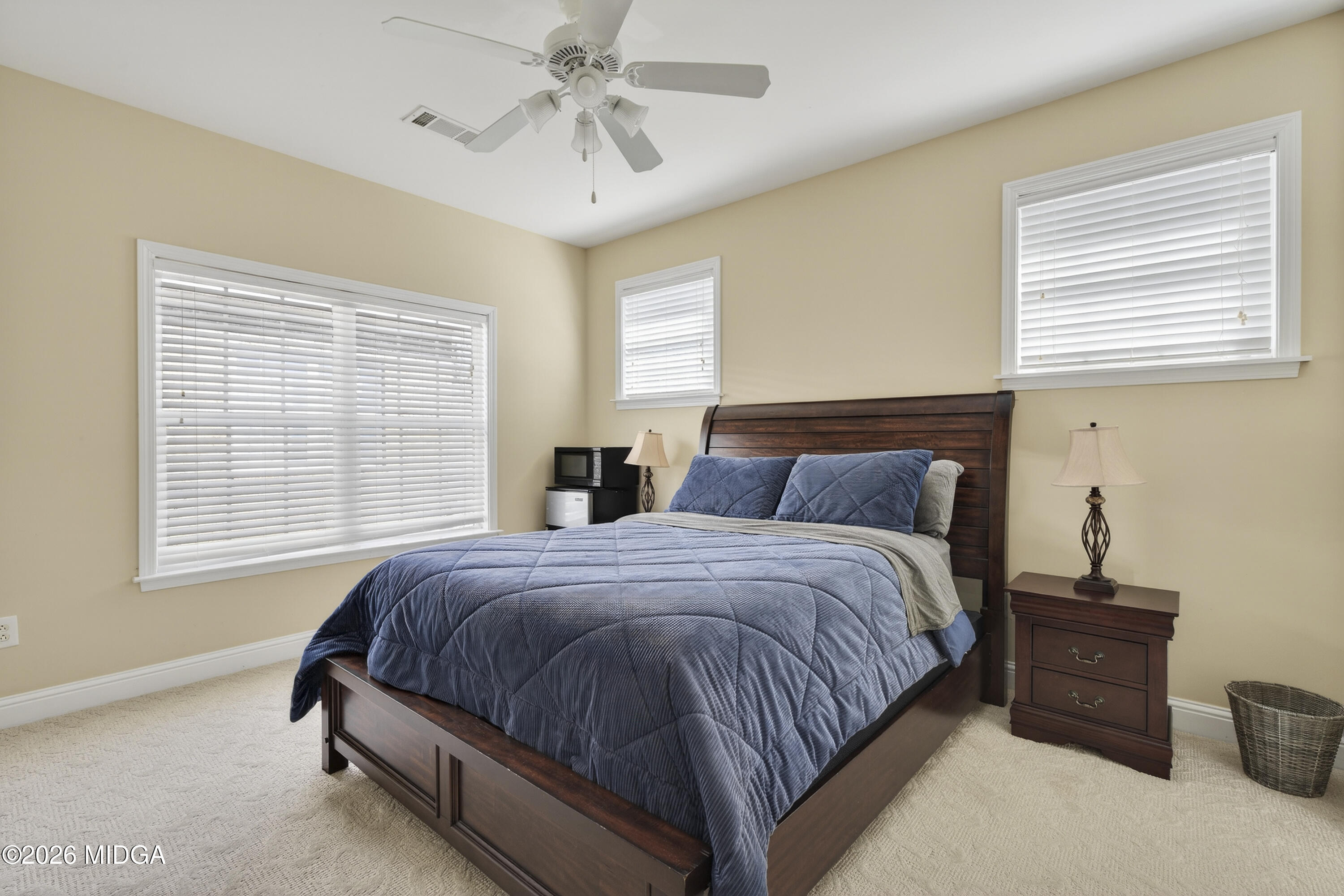 855 Tufthunter Macon, GA 31210 - Photo 62 of 86 a bedroom with a bed lamp and window