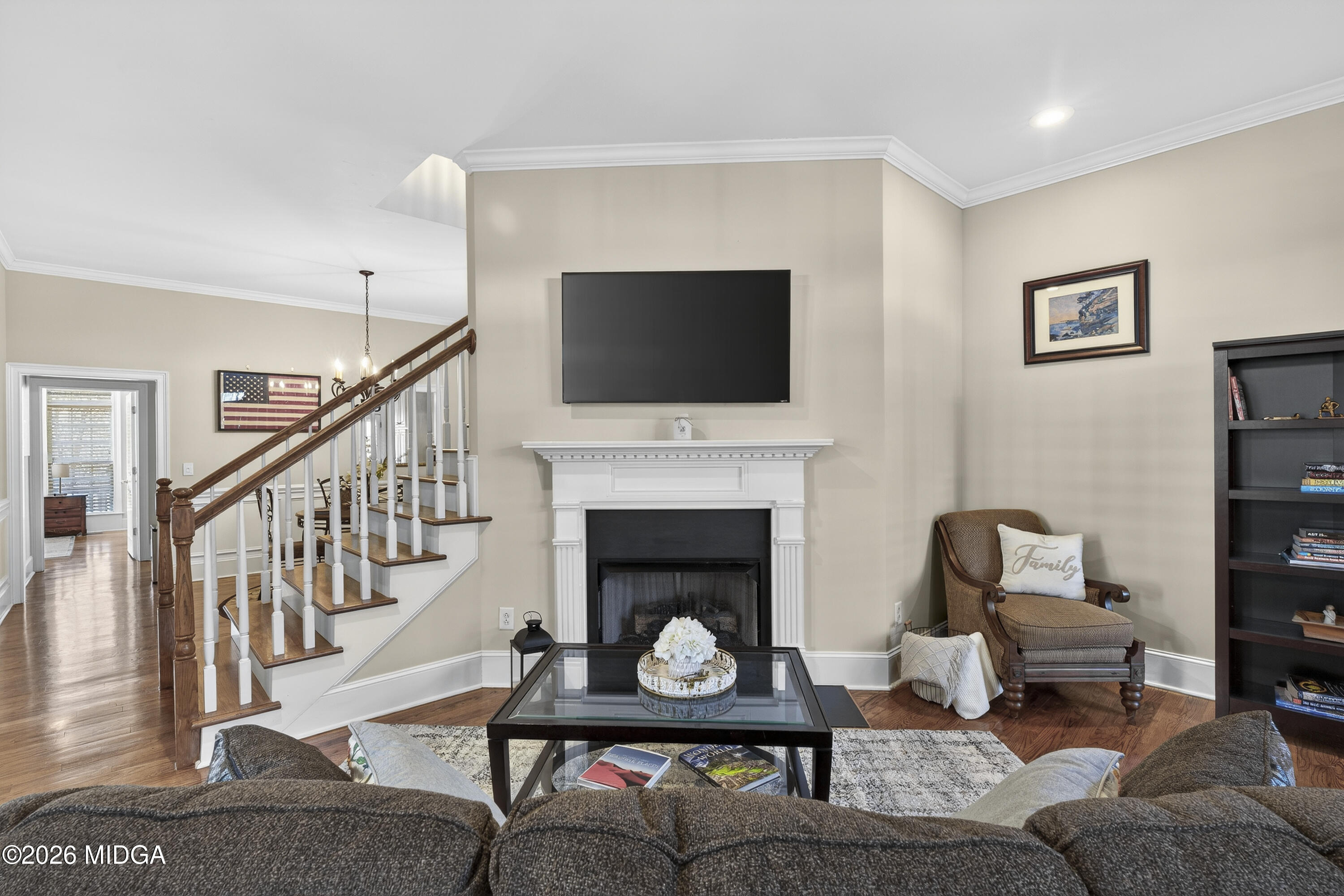 855 Tufthunter Macon, GA 31210 - Photo 7 of 87 a living room with furniture a rug and a fireplace