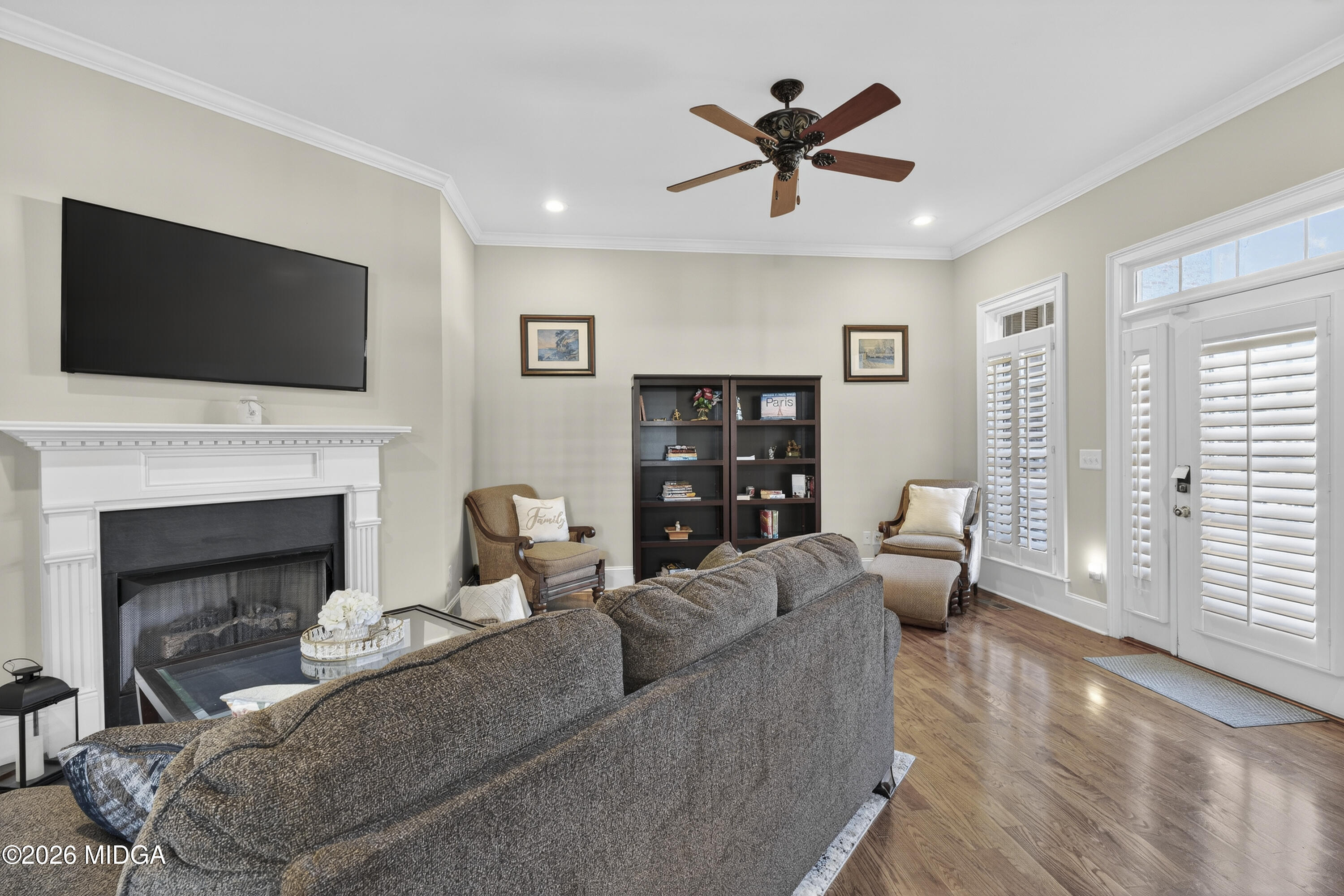 855 Tufthunter Macon, GA 31210 - Photo 8 of 87 a living room with furniture a fireplace and a flat screen tv