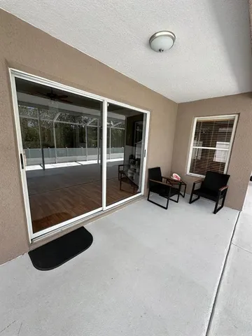 a view of livingroom with furniture and stairs