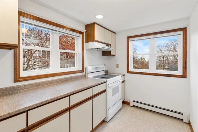 a hallway with a large window