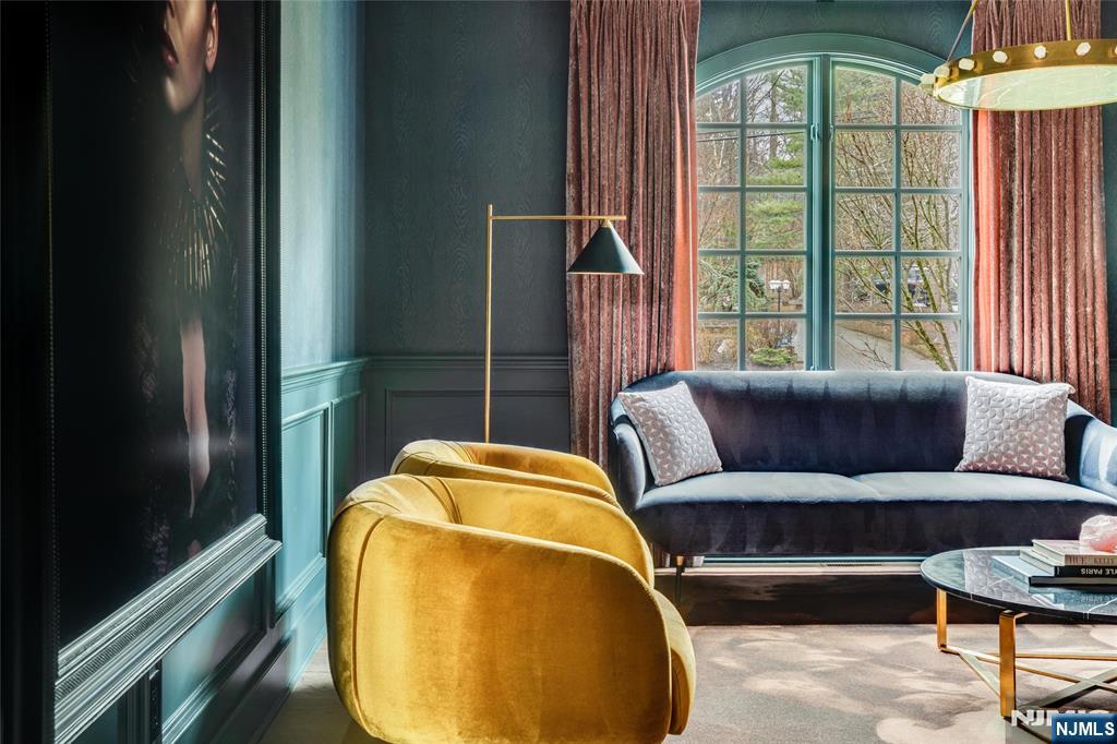 11 Hamilton Road Short Hills, NJ 07078 - Photo 8 of 50 a living room with a couch and a table