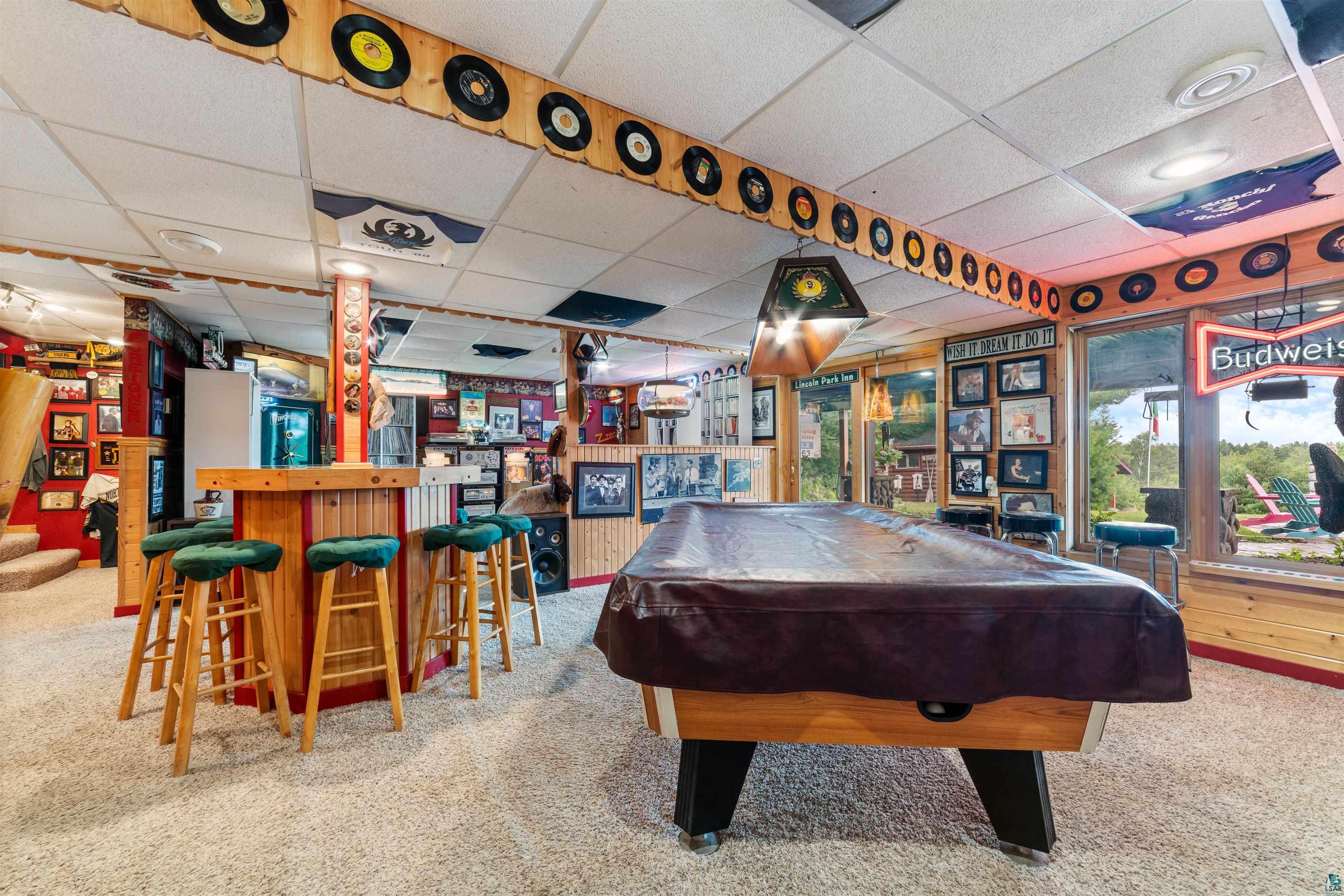 11911 East Rowe Road Lake Nebagamon, WI 54849 - Photo 60 of 61 Recreational space featuring a built-in bar with seating, a pool table, and carpeted flooring