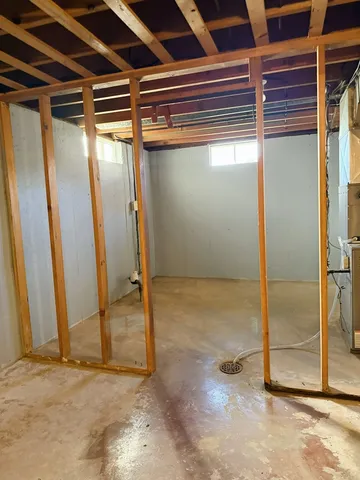a view of a room with wooden walls