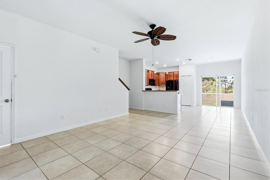 12909 Dream Catcher Way Riverview, FL 33579 - Photo 9 of 32 a view of a livingroom with a ceiling fan and window