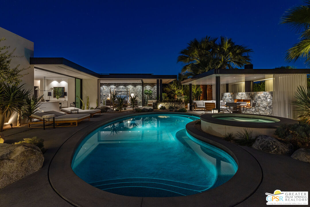 72453 Rancho Road Rancho Mirage, CA 92270 - Photo 1 of 60 a view of a swimming pool with a patio