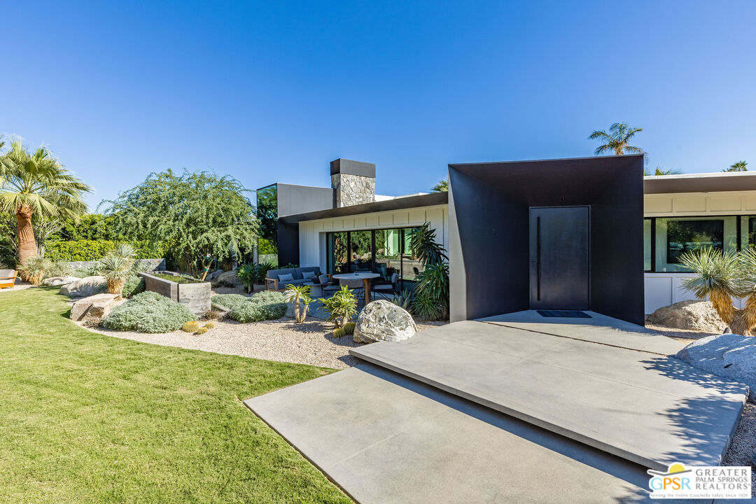 72453 Rancho Road Rancho Mirage, CA 92270 - Photo 12 of 60 a view of a house with backyard porch and sitting area