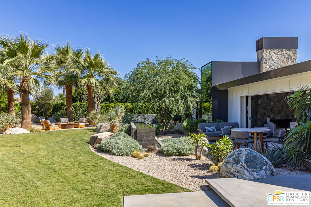 72453 Rancho Road Rancho Mirage, CA 92270 - Photo 15 of 60 a view of a house with backyard and sitting area