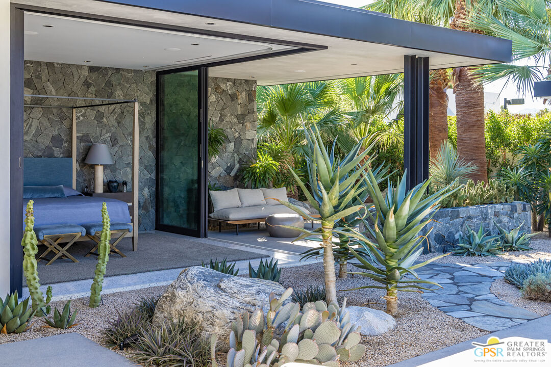 72453 Rancho Road Rancho Mirage, CA 92270 - Photo 36 of 60 a garden view with a seating space