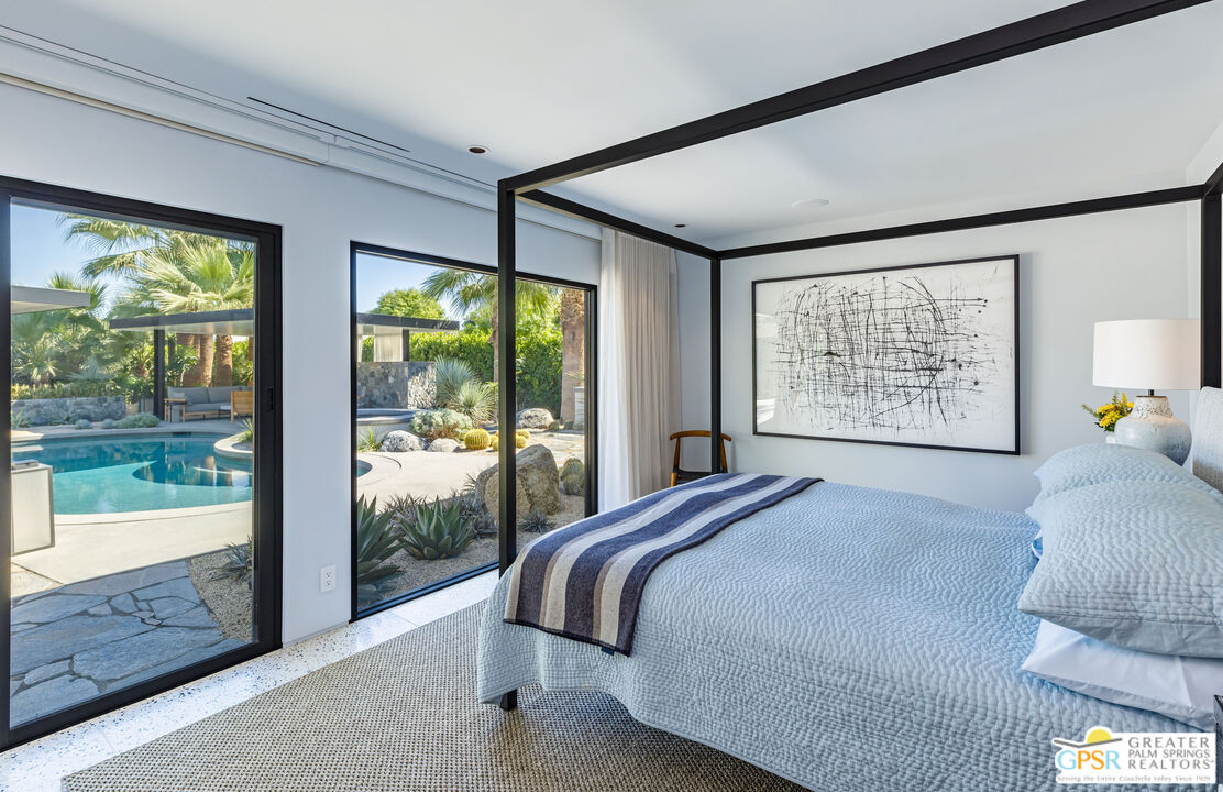 72453 Rancho Road Rancho Mirage, CA 92270 - Photo 46 of 60 a bed sitting in a bedroom next to a window