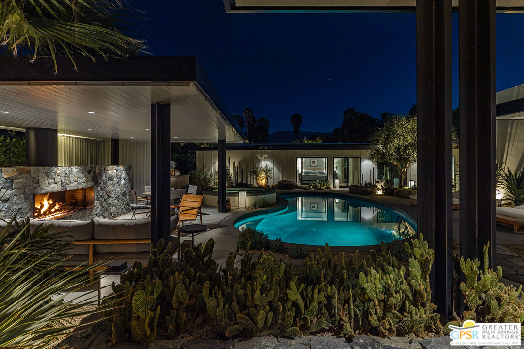 72453 Rancho Road Rancho Mirage, CA 92270 - Photo 59 of 60 a view of a porch with a table and chairs