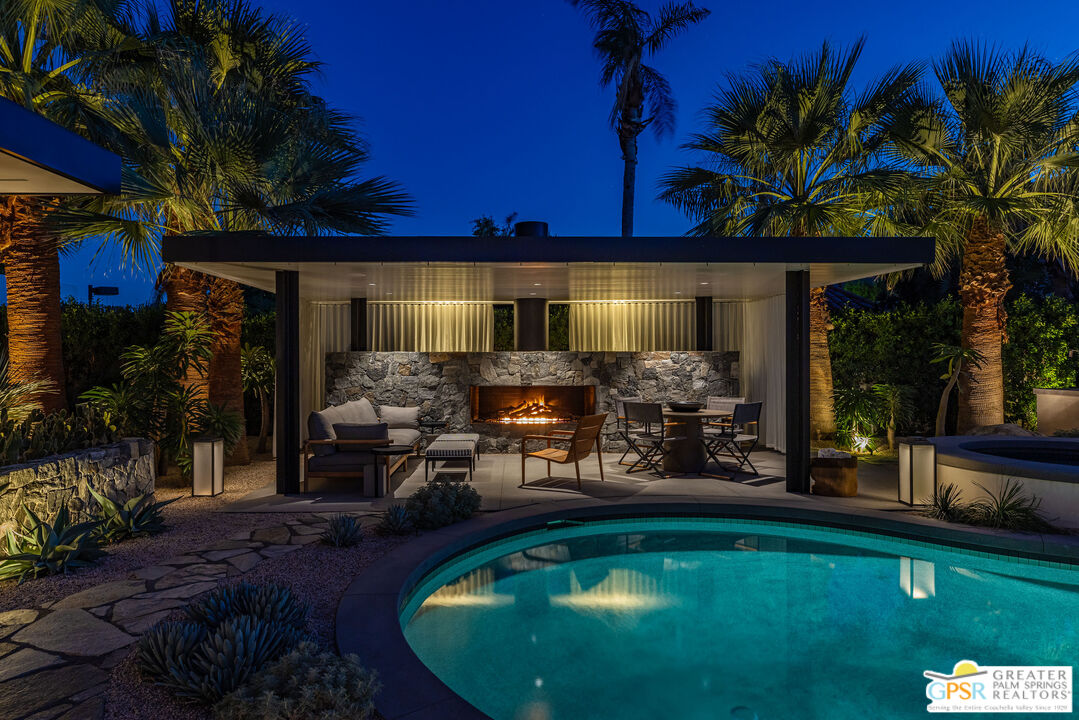 72453 Rancho Road Rancho Mirage, CA 92270 - Photo 6 of 60 a view of a house with swimming pool and sitting area