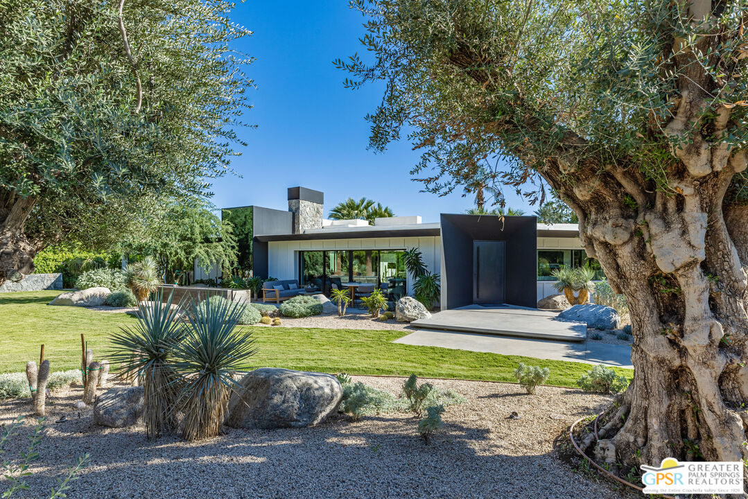 72453 Rancho Road Rancho Mirage, CA 92270 - Photo 9 of 60 a view of a house with backyard and sitting area