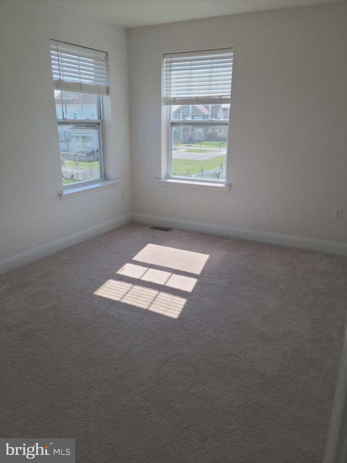 1756 Michelangelo Drive Middletown, DE 19709 - Photo 17 of 24 an empty room with windows