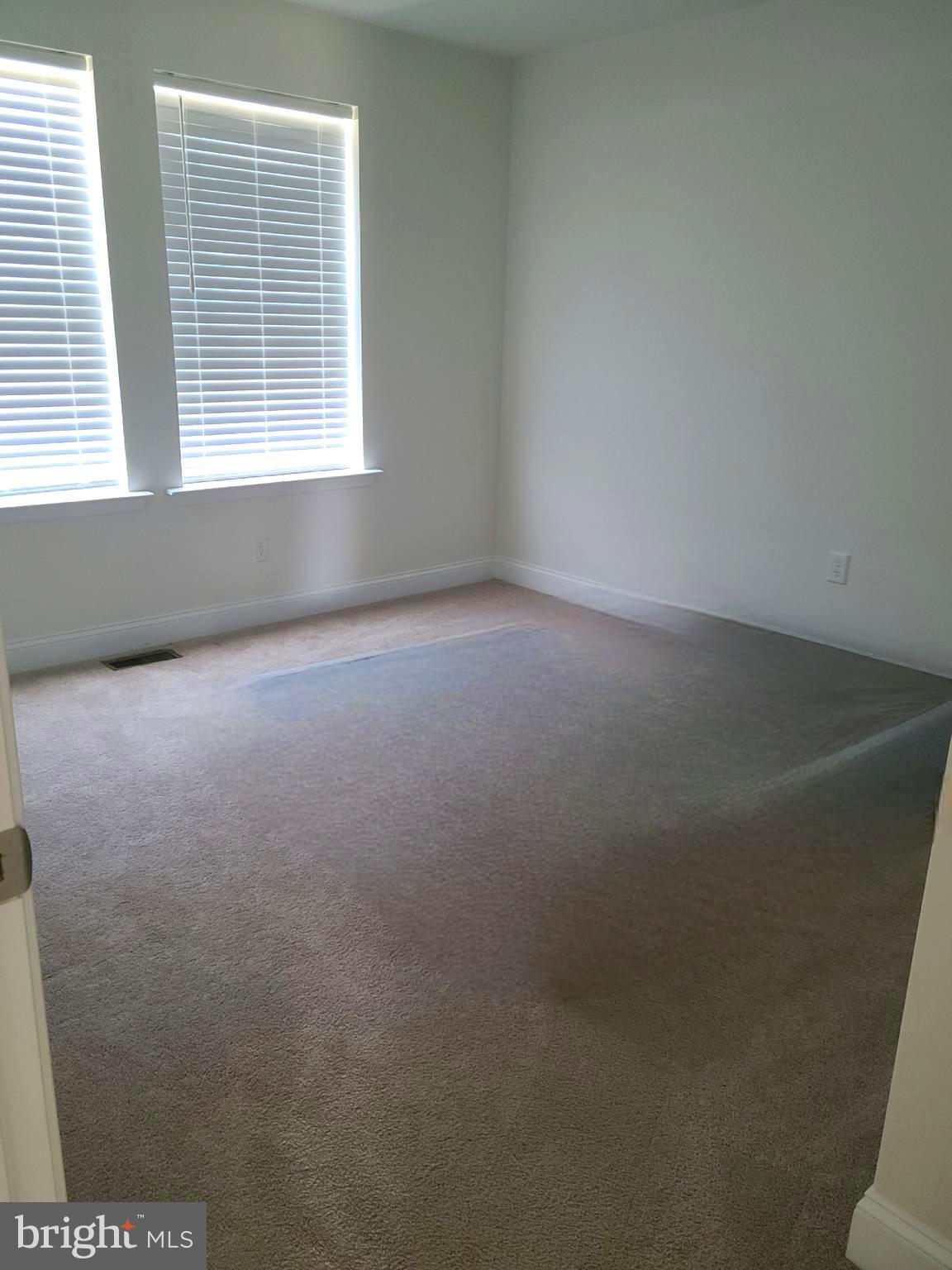 1756 Michelangelo Drive Middletown, DE 19709 - Photo 18 of 24 a view of an empty room with a window