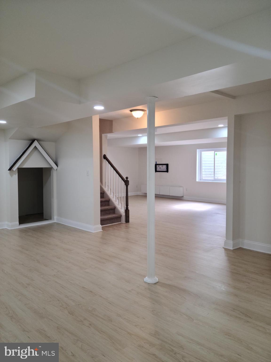 1756 Michelangelo Drive Middletown, DE 19709 - Photo 19 of 24 a view of empty room with wooden floor