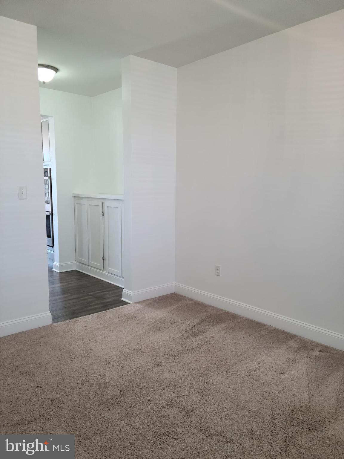 1756 Michelangelo Drive Middletown, DE 19709 - Photo 7 of 24 an empty room with an entrance to other room
