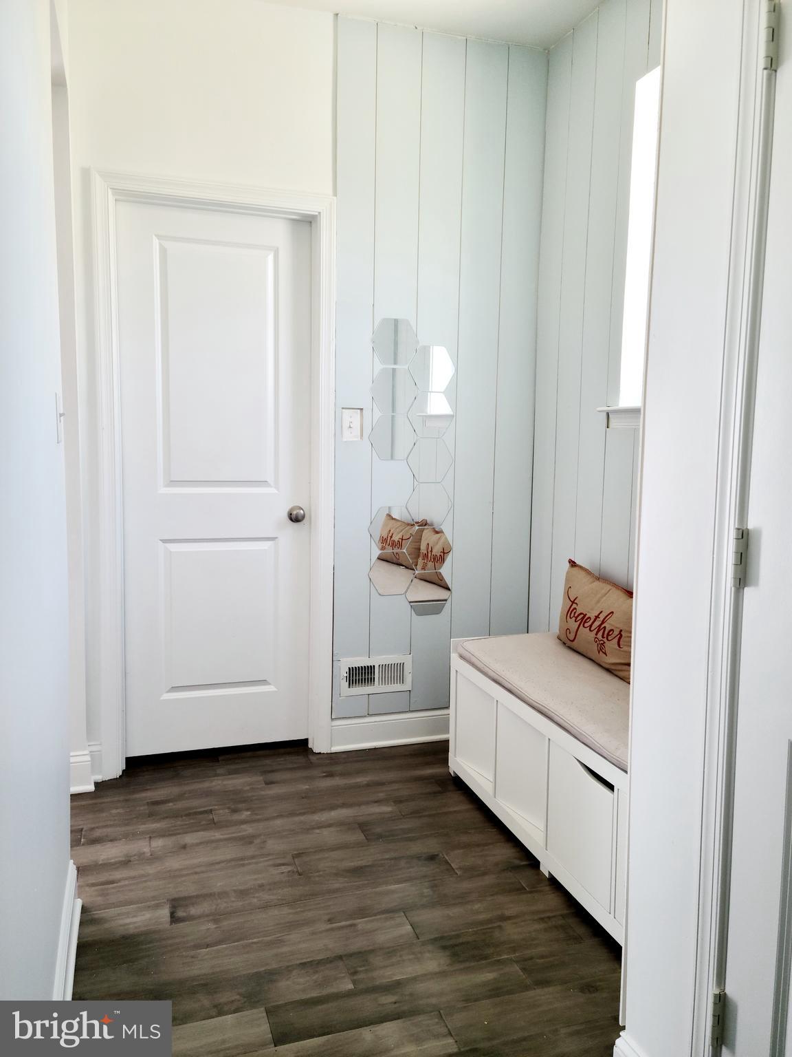 1756 Michelangelo Drive Middletown, DE 19709 - Photo 9 of 24 a bedroom with a bed and a mirror