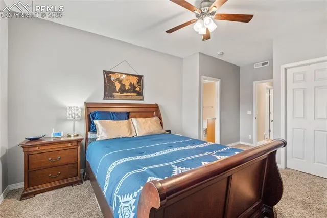 a white toilet sitting next to a shower curtain