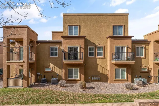 a city street lined with tall buildings