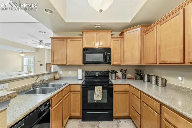 a kitchen with a sink and a window