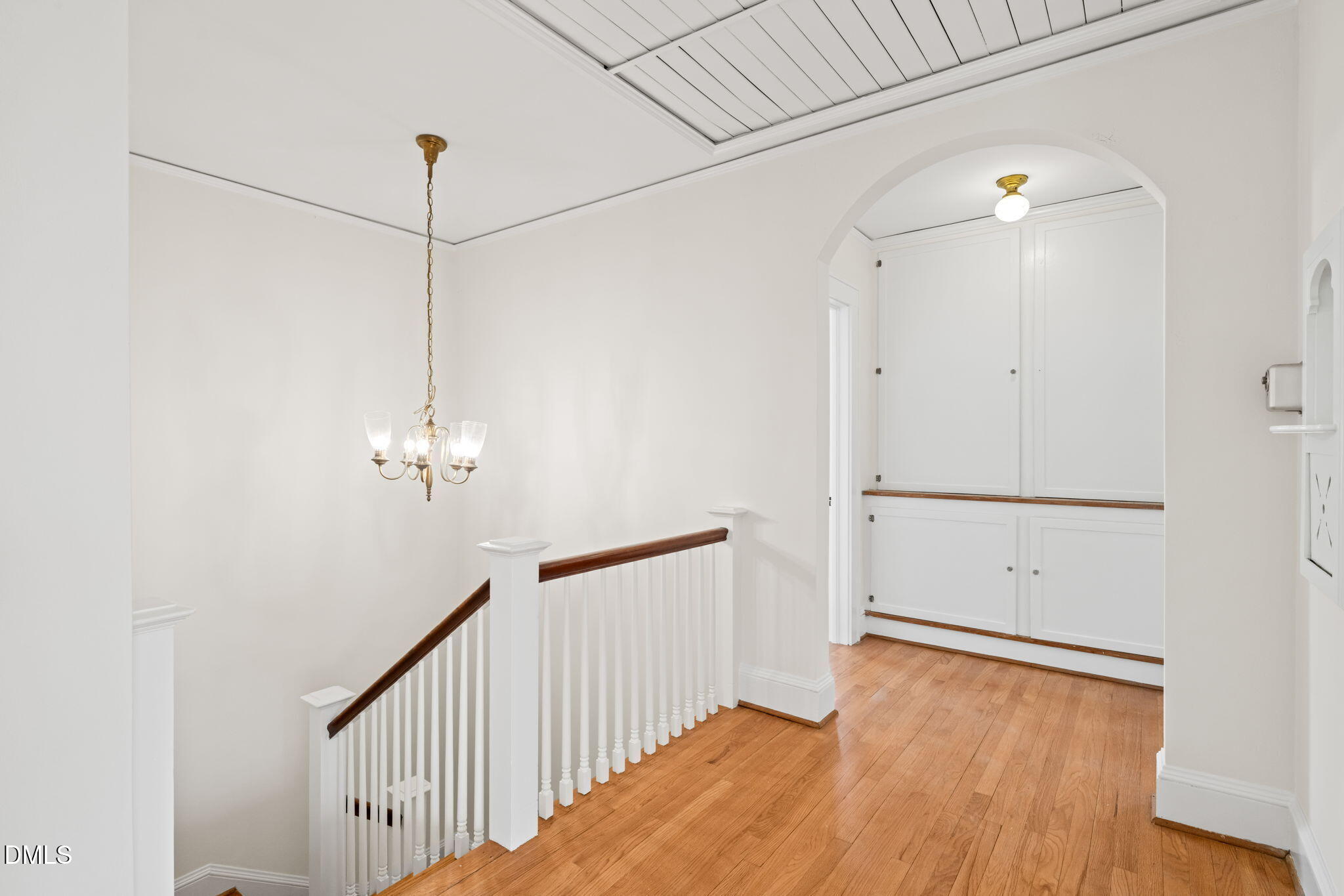 907 West Johnson Street Raleigh, NC 27605 - Photo 18 of 43 a view of a room with wooden floor and ceiling fan