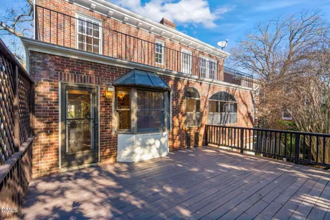 a view of a building with a bench in front of it