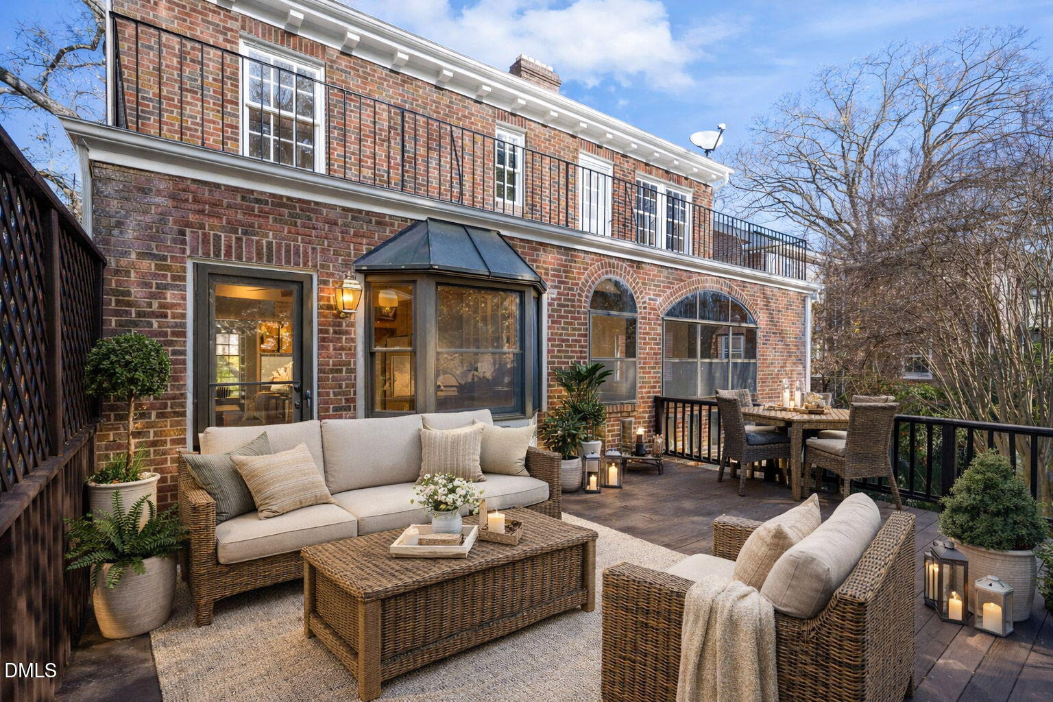 907 West Johnson Street Raleigh, NC 27605 - Photo 2 of 43 a view of a patio with couches table and chairs and potted plants