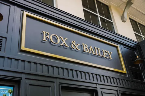 a view of swimming pool with a tub and couches