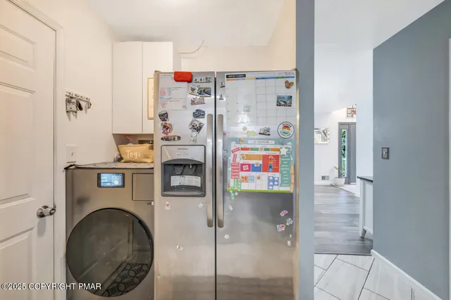 a view of a hallway with windows