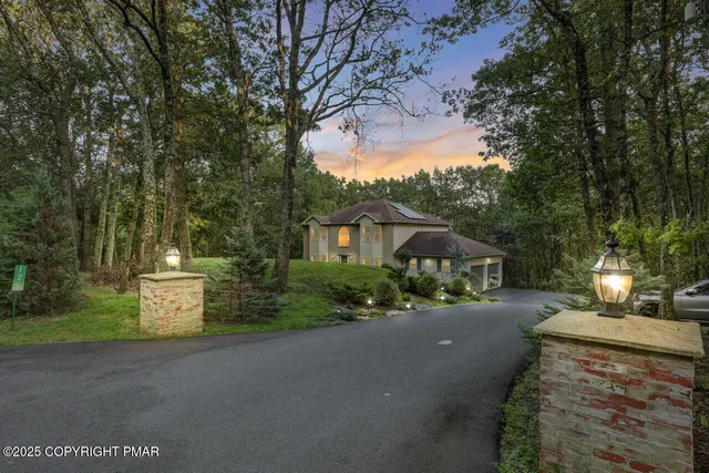 a view of a street with a building in the background
