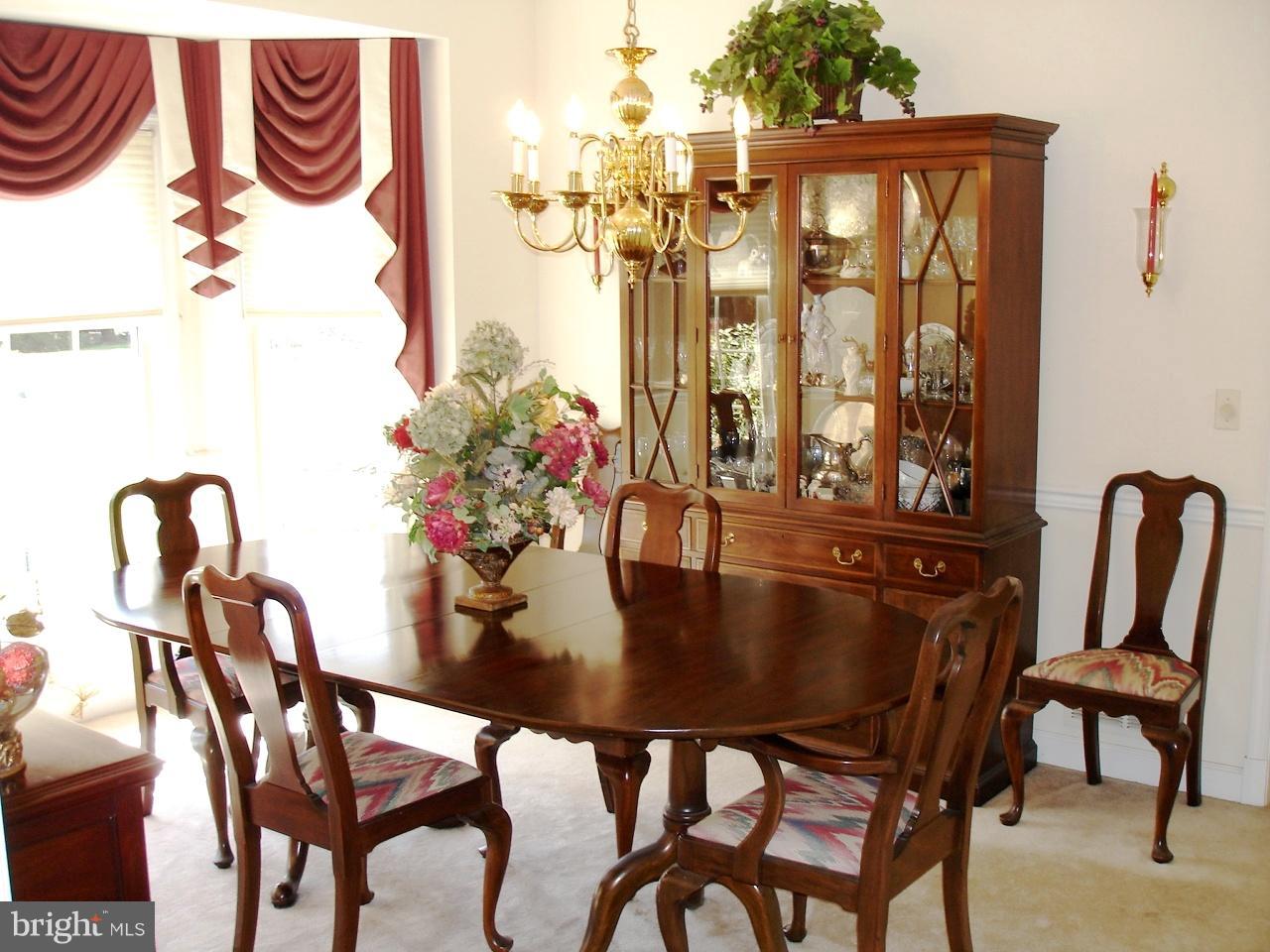 3812 Stansbury Mill Road Phoenix, MD 21131 - Photo 7 of 30 LIGHT FILLED FORMAL DINING ROOM