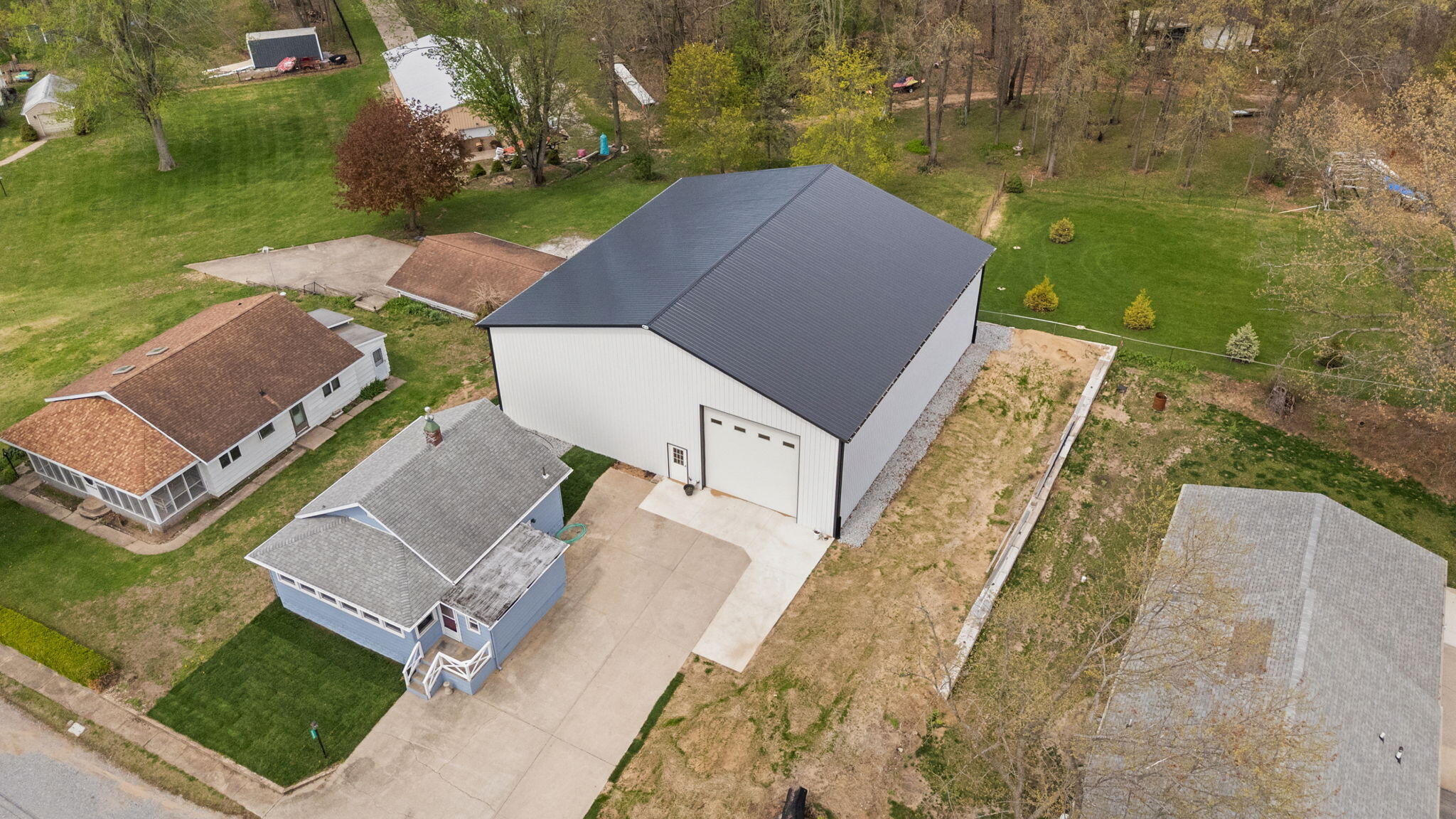5590 East Maple Street Knox, IN 46534 - Photo 4 of 32 an aerial view of a house with a yard