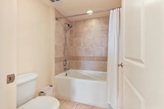 an empty room with wooden floor