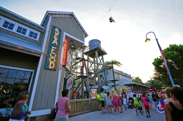 a view of a building with potted plants