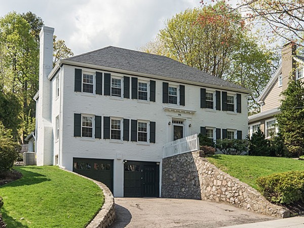 50 Blake Road Brookline, MA 02445 - Photo 1 of 18 a front view of a house with a yard