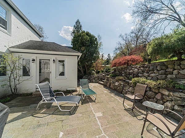 50 Blake Road Brookline, MA 02445 - Photo 18 of 18 a view of backyard with outdoor seating and plants