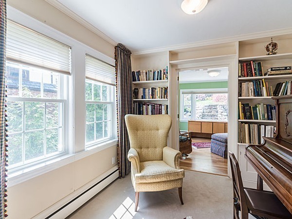 50 Blake Road Brookline, MA 02445 - Photo 9 of 18 a living room with furniture and a book shelf