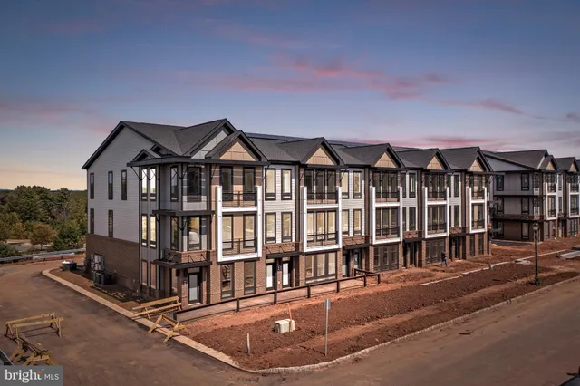a front view of a house with a porch