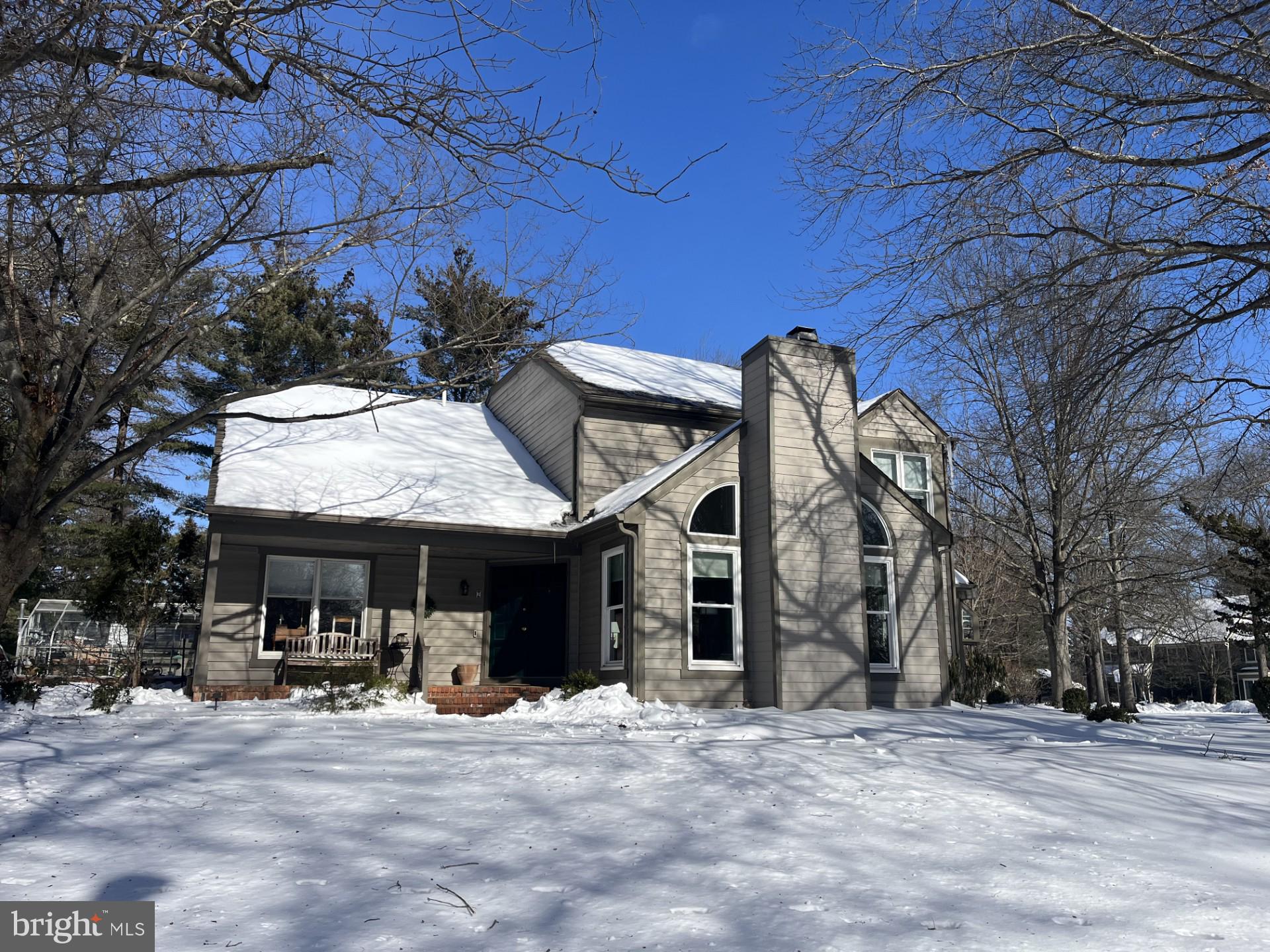 2 Baldwin Court Pennington, NJ 08534 - Photo 2 of 2 a view of a house with a patio