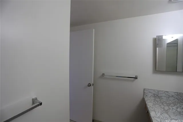 a view of hallway with washer and dryer