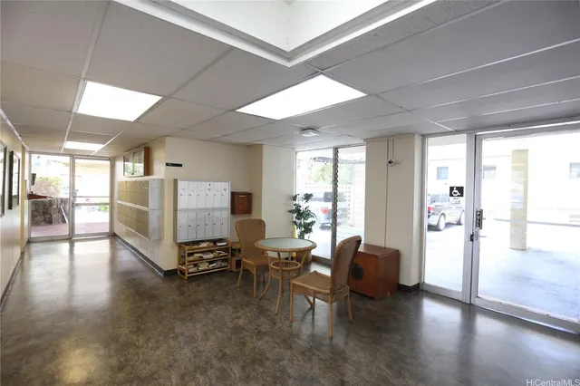 a view of building with parking space