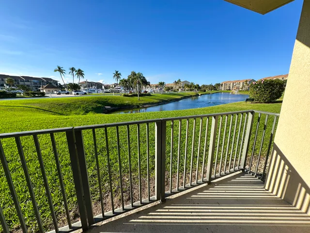 a view of a balcony with an outdoor space