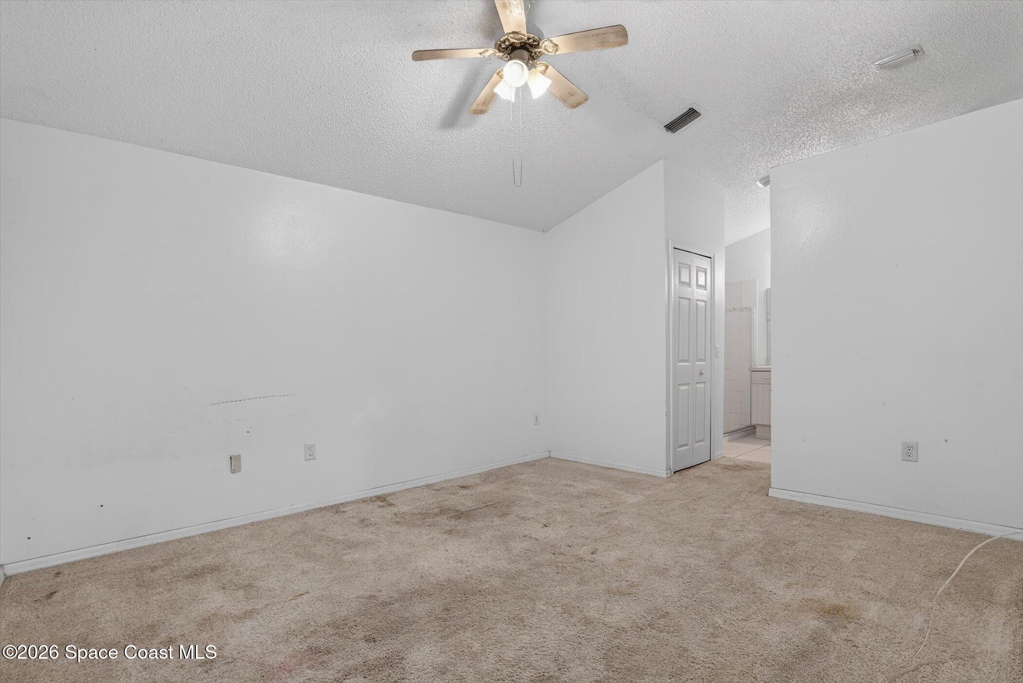 1091 Ray Road Southeast Palm Bay, FL 32909 - Photo 15 of 25 Primary Bedroom