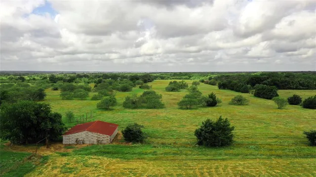 a view of a yard with an outdoor space