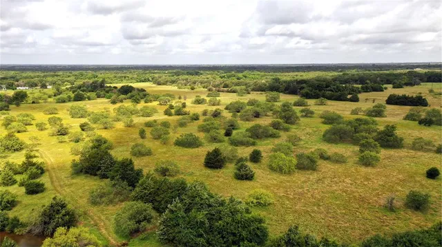 a view of outdoor space with green field